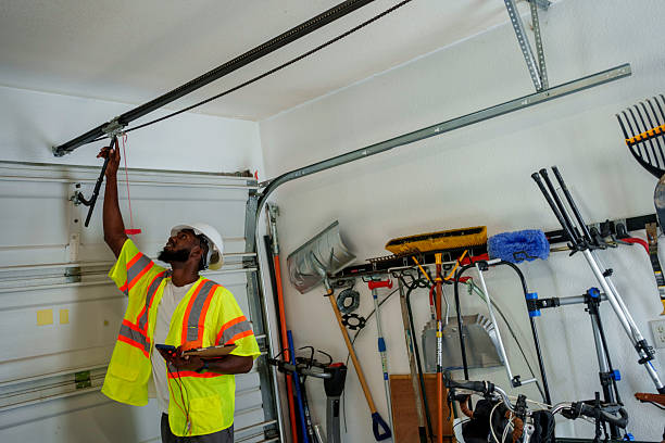 Professional Garage Door Panel Replacement technician working in Preston, IA